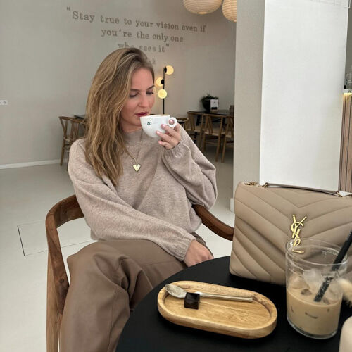 Cashmere trui met trekkoord aan de taille